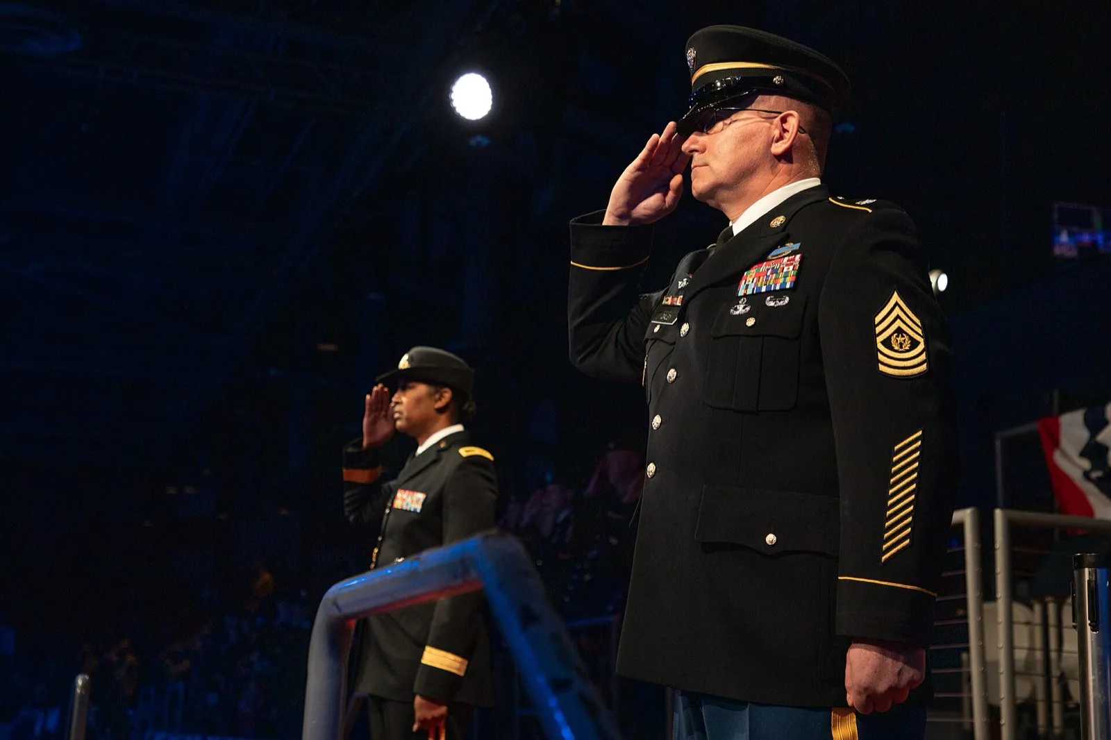 A senior noncommissioned officer salutes during a military retirement ceremony